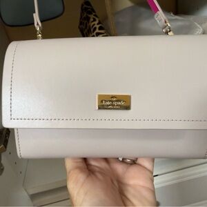 kate spade pale pink leather crossbody with gold plaque